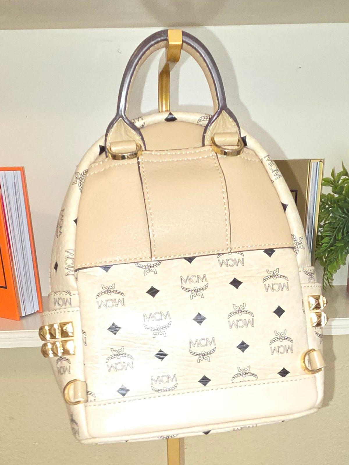 Pre-Loved  MCM Stark X-Mini Side Studs Backpack