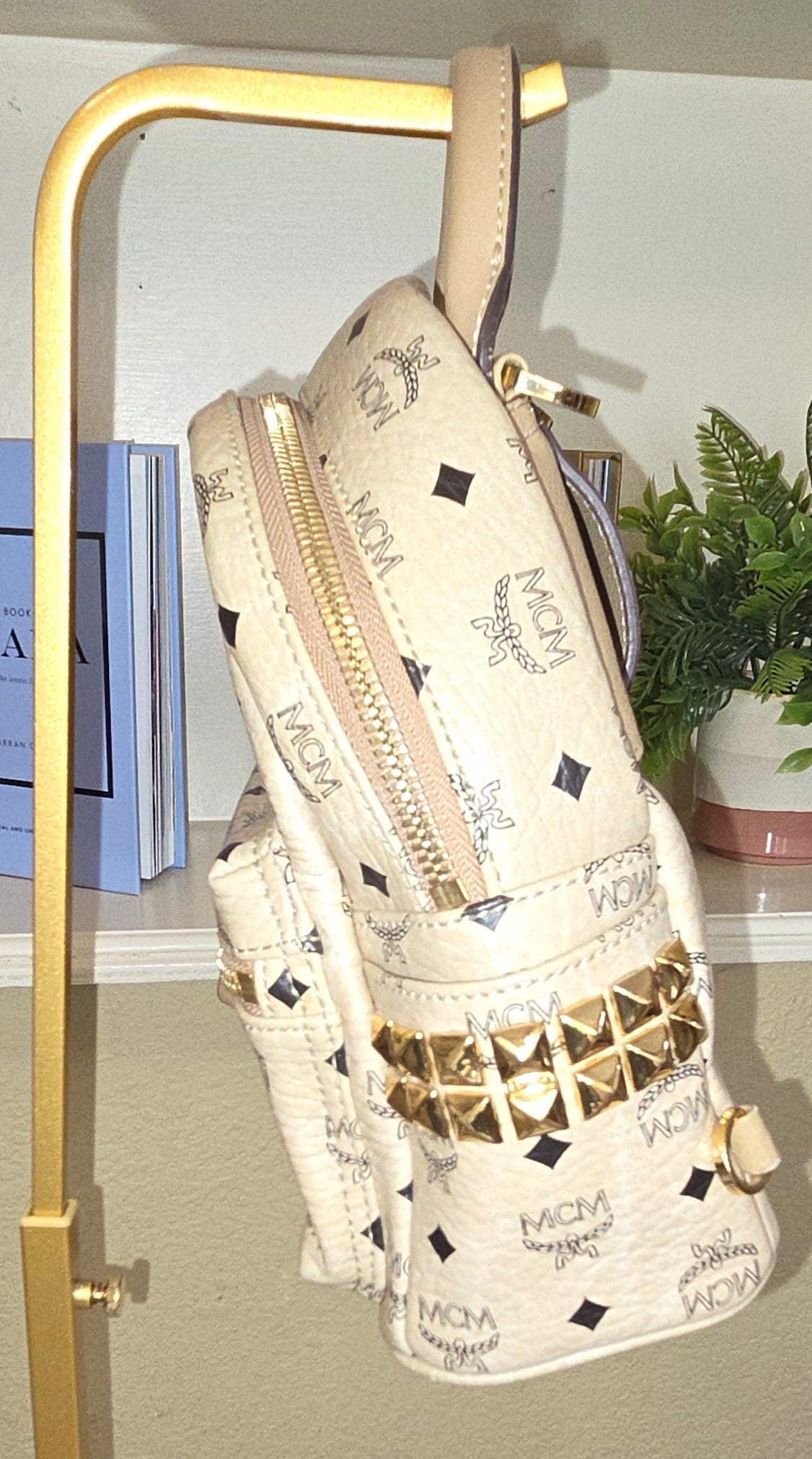 Pre-Loved  MCM Stark X-Mini Side Studs Backpack